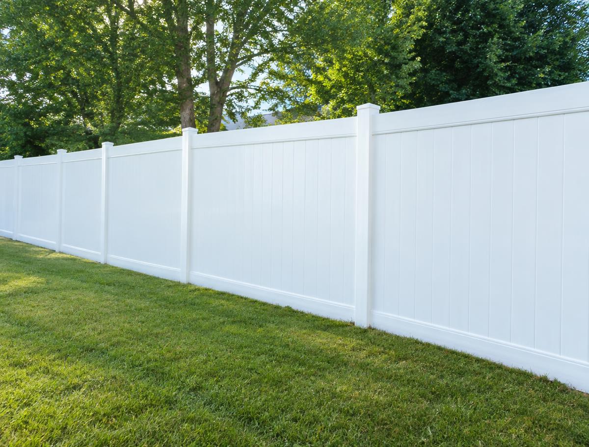 White vinyl fence — after cleaning